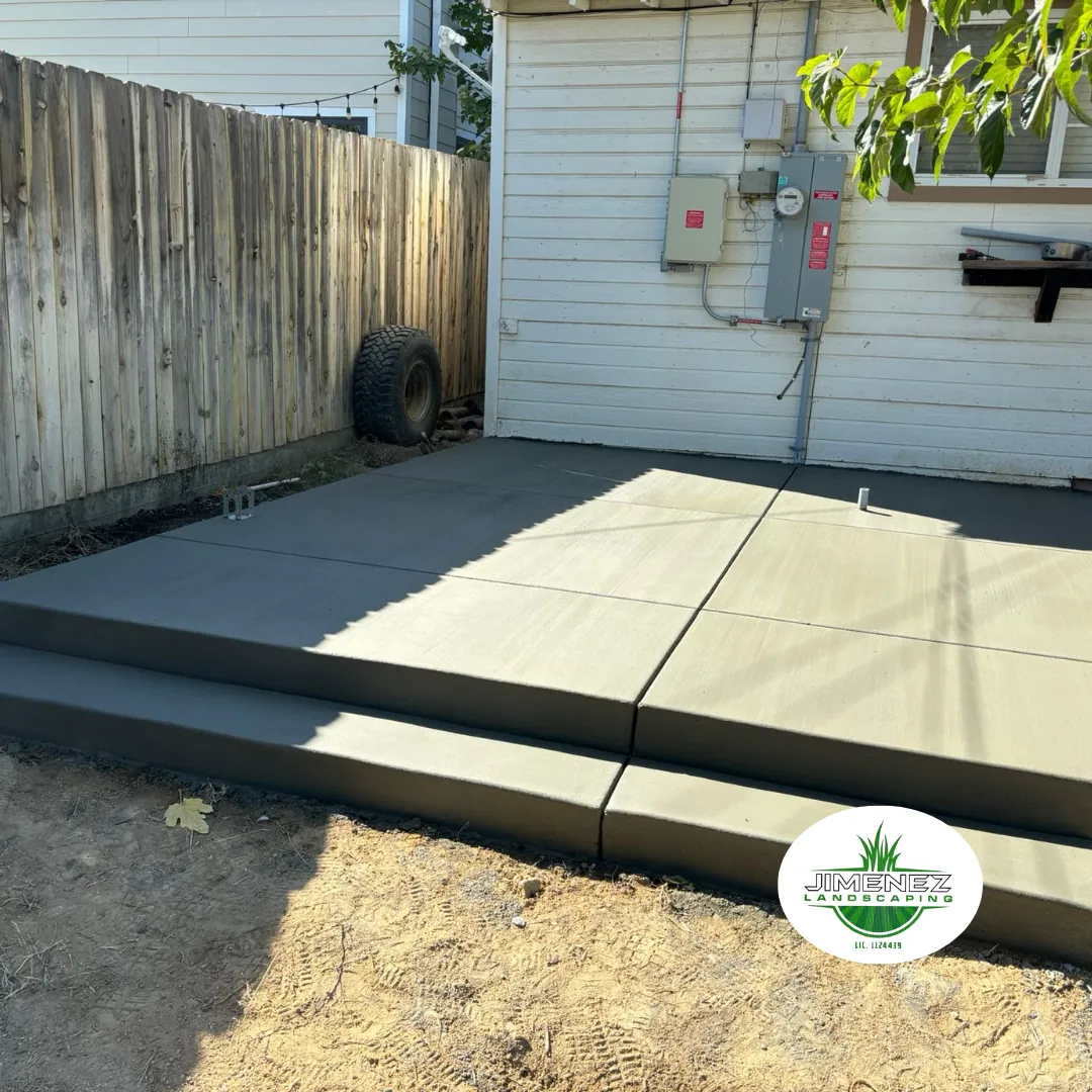 Concrete stairs and patio area installed by Jimenez Landscaping, showcasing durable concrete work in a residential setting in Bakersfield.