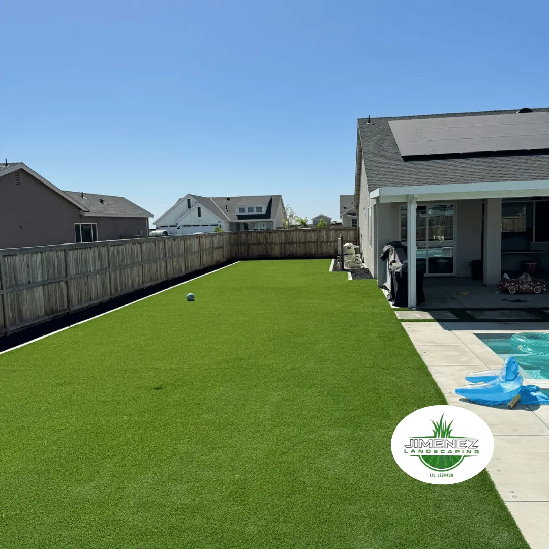Backyard putting green featuring lush synthetic turf installed by Jimenez Landscaping, providing a low-maintenance recreational space in Bakersfield.